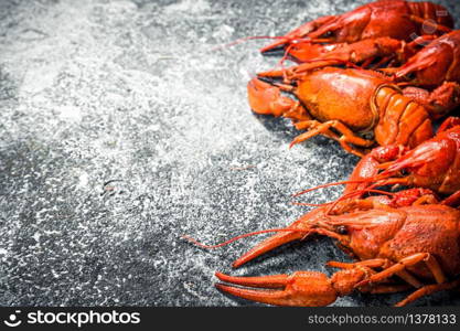 Fresh cooked crayfish. On a rustic background.. Fresh cooked crayfish.