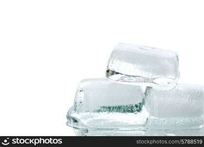 Fresh cool ice cubes macro close up isolated on white. Ice cubes