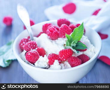 fresh cottage with raspberry in the bowl