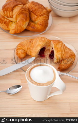 fresh croissant french brioche and coffee typical traditional Italian breakfast