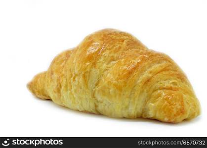 Fresh Croissant isolated on white background. Croissant is a French crescent-shaped roll made of sweet flaky pastry often eaten for breakfast.