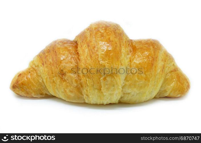 Fresh Croissant isolated on white background. Croissant is a French crescent-shaped roll made of sweet flaky pastry often eaten for breakfast.