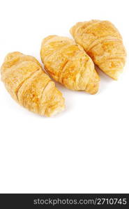 fresh croissants isolated on white background