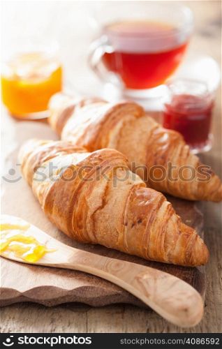 fresh croissants with jam for breakfast