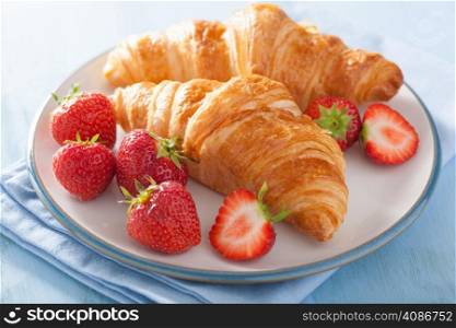 fresh croissants with strawberry for breakfast