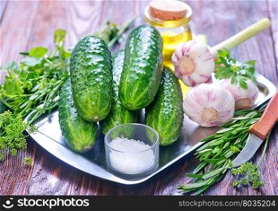 fresh cucumber an garlic on a table