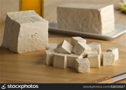 Fresh cut pieces of raw tofu