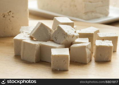 Fresh cut pieces of raw tofu