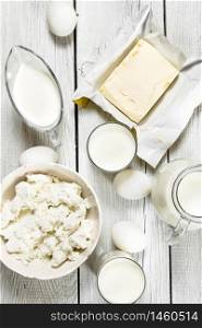 Fresh dairy products on white wooden background.. Fresh dairy products