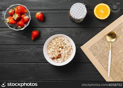 fresh delicious breakfast with fruits textured wooden plank