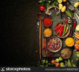 Fresh delicious ingredients for healthy cooking on rustic background, top view. Diet, cooking, clean eating or vegetarian food concept.