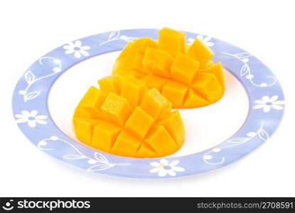 Fresh delicious mango fruit in dish, tropical fruit.