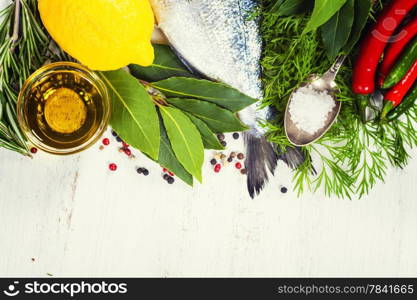 fresh dorado fish and vegetables on wooden board - food and drink