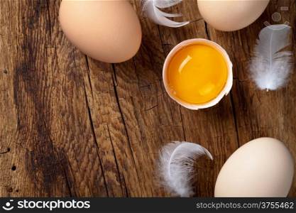 Fresh eggs on wood background. Copy space. Top view&#xA;