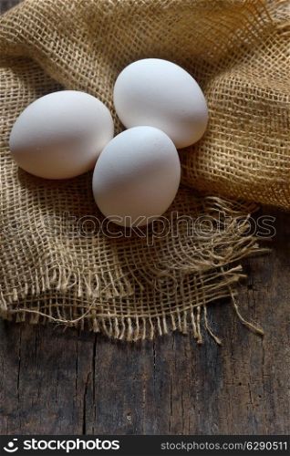 Fresh farm eggs on wooden background. organic product