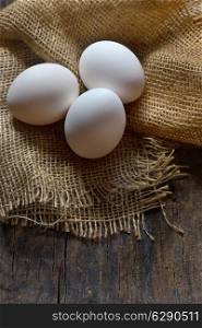 Fresh farm eggs on wooden background. organic product