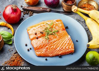 Fresh fish.Raw salmon fillet with cooking ingredients. Fresh raw salmon fish