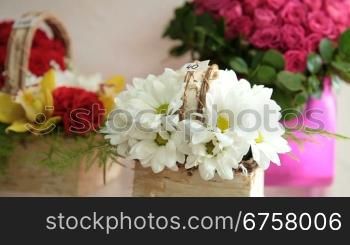 Fresh Flower Basket Arrangements In Florist Shop. Closeup, Tracking Shot