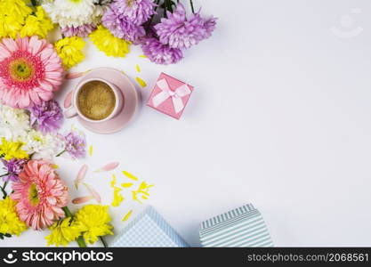 fresh flowers near cup drink present boxes petals