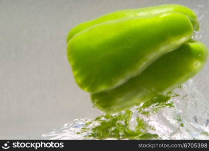 Fresh food fall into water creating interesting patterns with the bubbles caused.