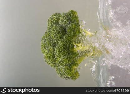 Fresh food fall into water creating interesting patterns with the bubbles caused.