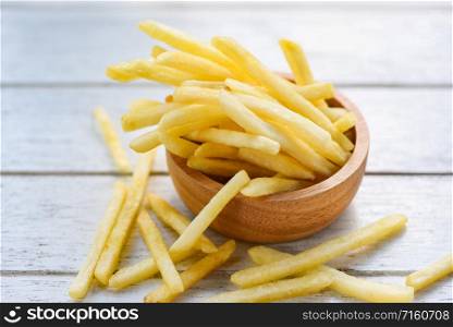 Fresh french fries in wooden bowl delicious Italian meny homemade ingredients / Tasty potato fries for food or snack