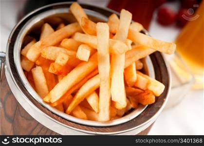 fresh french fries on a bucket extreme close up macro