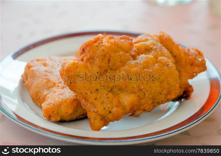 Fresh fried chicken on dish , fast food dish