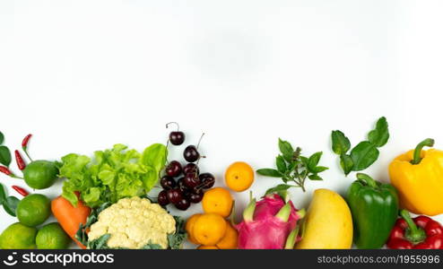 Fresh fruit and vegetable. Flat lay of fresh raw organic vegetables on white background