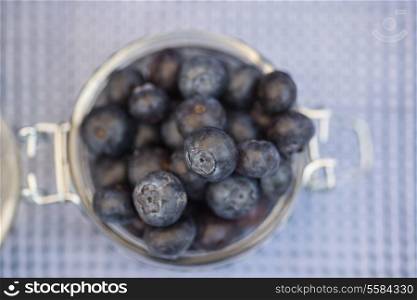 Fresh fruit blueberry in glass storage jar