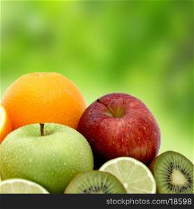 Fresh fruit on a blurred green background