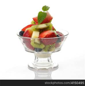 fresh fruit salad in a glass dish