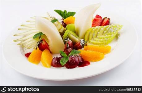 Fresh fruit salad on white plate isolated on white