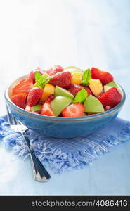 fresh fruit salad with strawberry, apple, nectarine, pomegranate