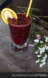 Fresh fruit smoothie from blueberry banana and orange juice. smoothie from blueberry banana and orange juice