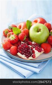 fresh fruits and berries. strawberry, apple, pomegranate