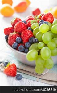 fresh fruits and berries. strawberry blueberry grape apricot