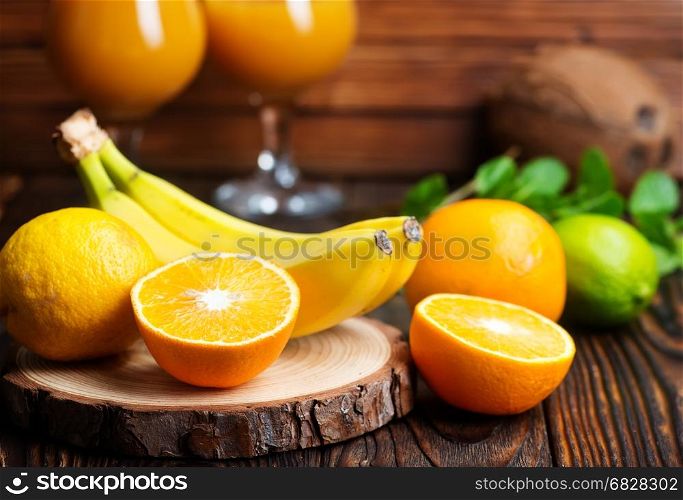 fresh fruits and juice on a table