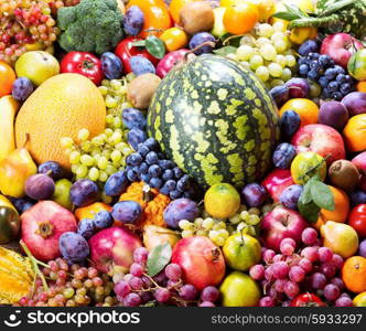 fresh fruits and vegetables as background