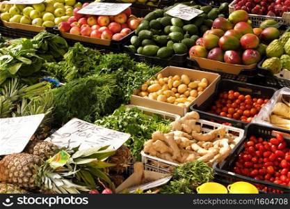 fresh fruits and vegetables for sale in a local farmers market
