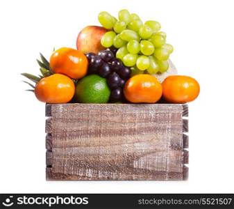 fresh fruits in a box on white background