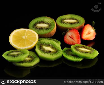 fresh fruits on black background