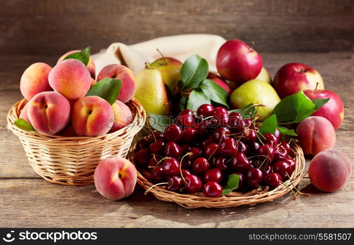 fresh fruits on wooden table