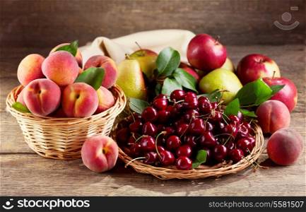 fresh fruits on wooden table