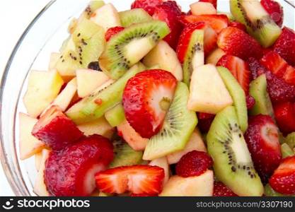 Fresh fruits salad on white background