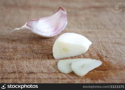 Fresh garlic on a wooden background