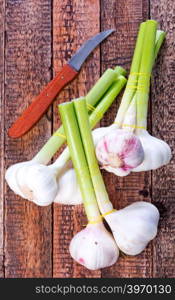 fresh garlic on the wooden table, garlic on a table