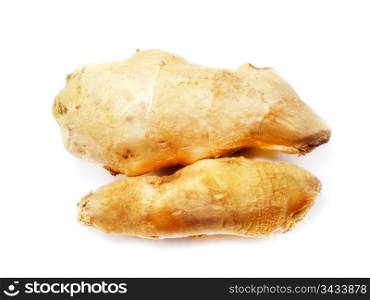 Fresh Ginger root on a white background