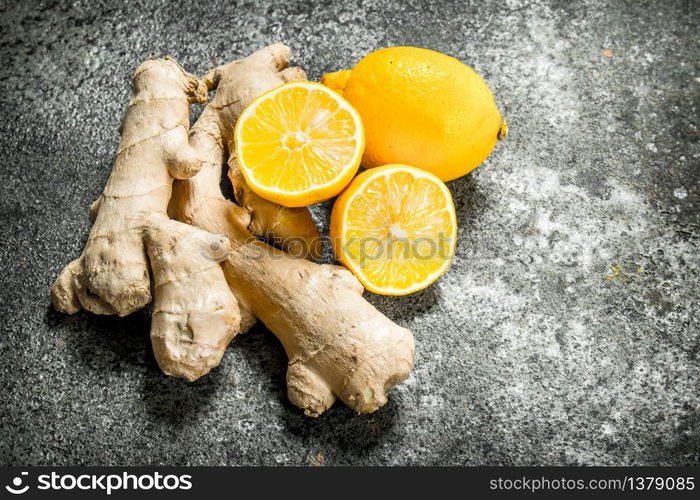 Fresh ginger root . On rustic background. Fresh ginger root .