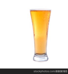 Fresh gold cold and delicious lager beer in glass over white background